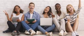 group of five multi-racial college students